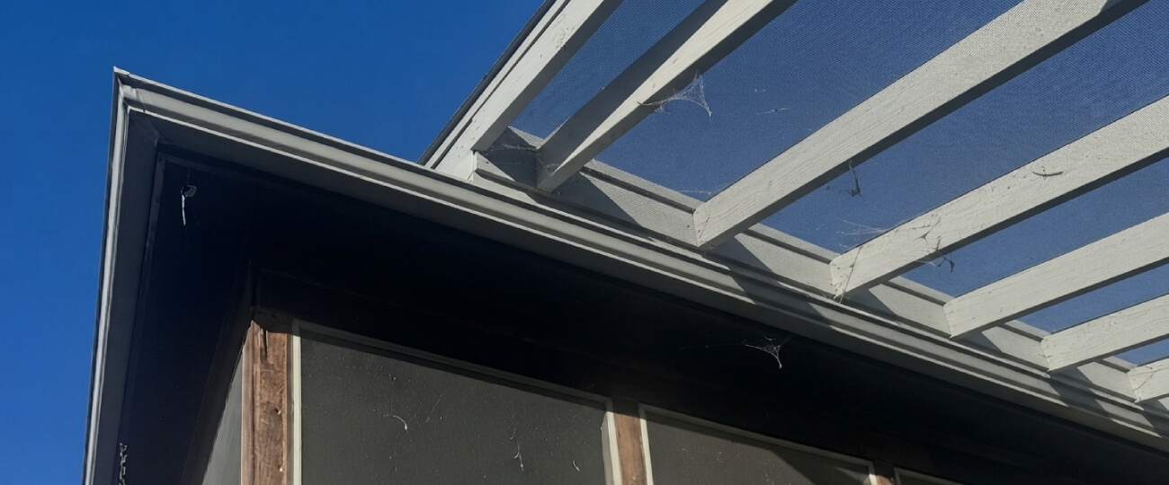 Roof line before Pure Gutter Solutions replaced the fascia, soffit and gutters